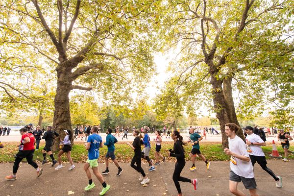 A large group of people running in the Royal Parks Half Marathon.